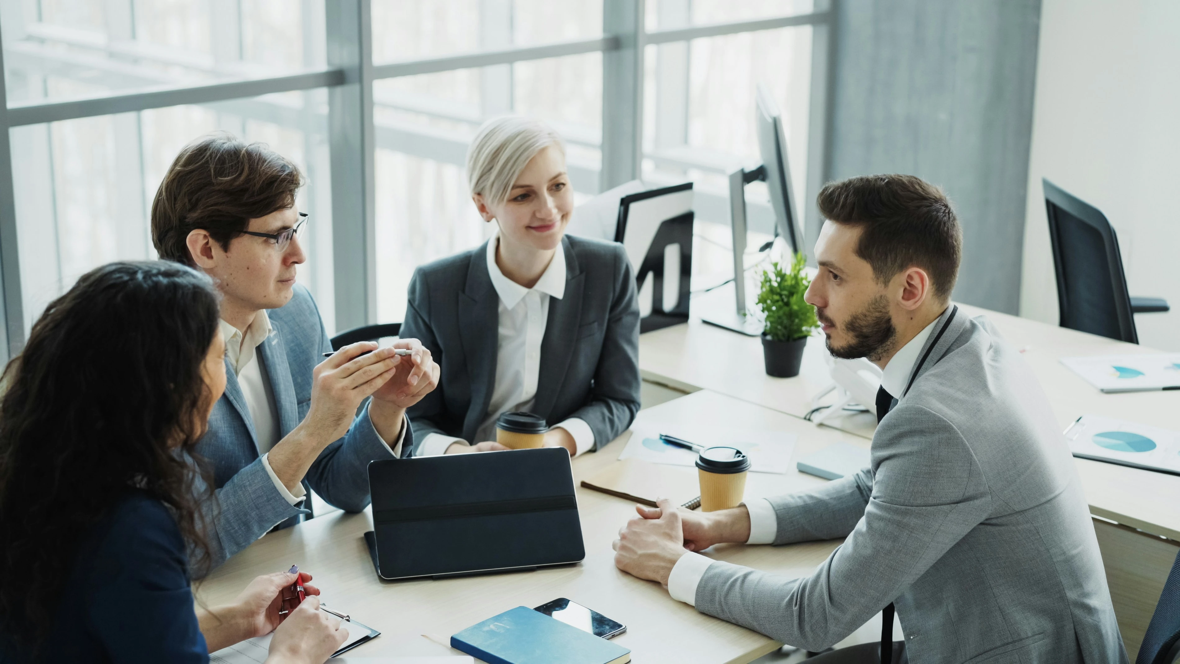 Teksource team in a meeting