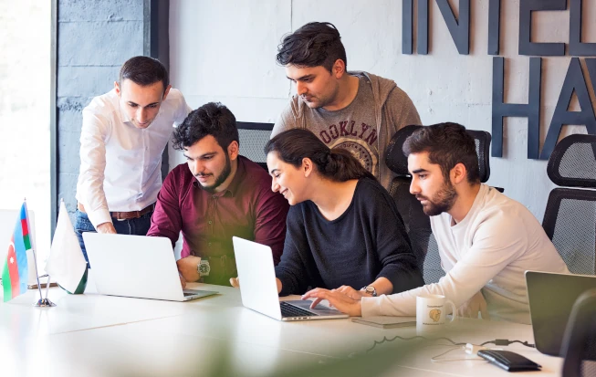Teksource team in a meeting